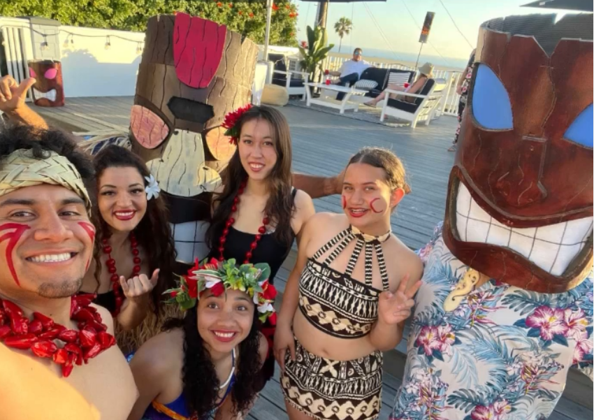 Tropical cocktails and colorful drinks at a luau party bar