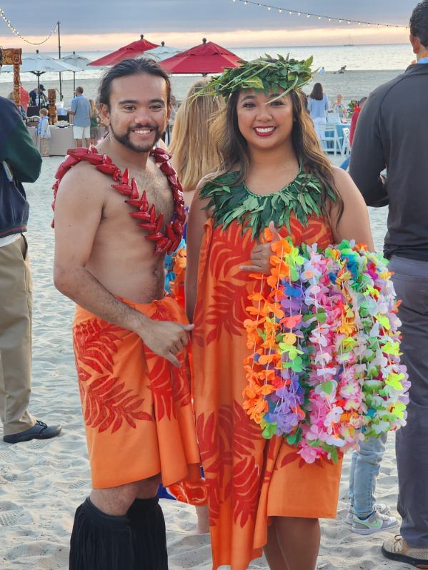 Hawaiian luau beach party at sunset in Southern California