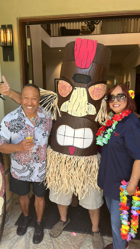 Hawaiian catering food spread at a luau event